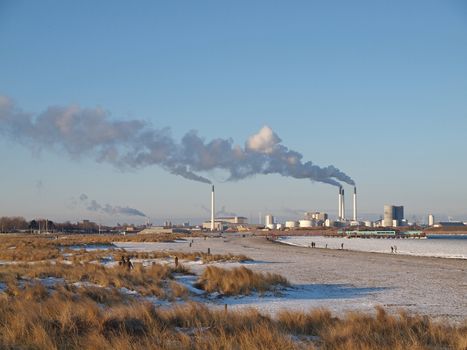 COPENHAGEN - JAN 20: The Amager Power Station viewed from the Amager Beach Park in Copenhagen, Denmark on January 20, 2013. It supplies 346.000 households with electricity.    