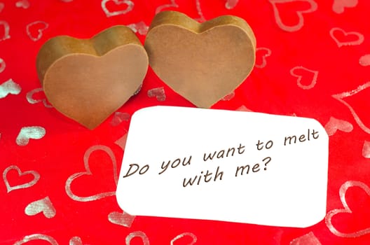 Valentine's image of two chocolate Hearts with message ad copyspace.