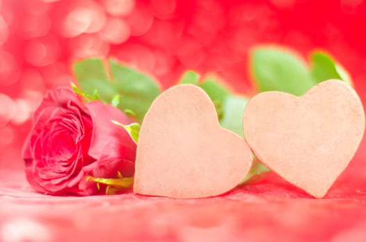 Valentine's image of two chocolate Hearts with rose in lovely background