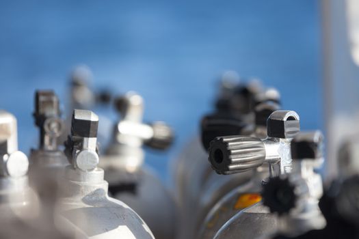 Close-up shot of valves with very short depth of field on scuba equipment.
