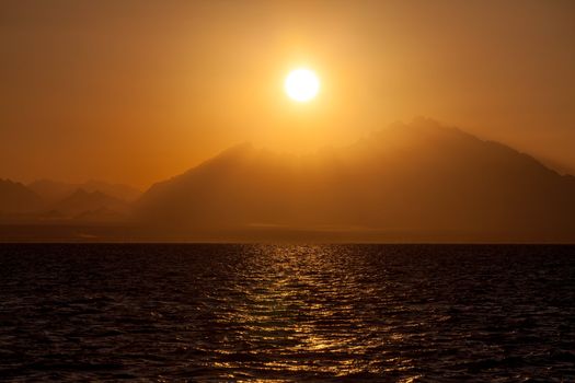 Romantic View of a Sunset over a Mountains