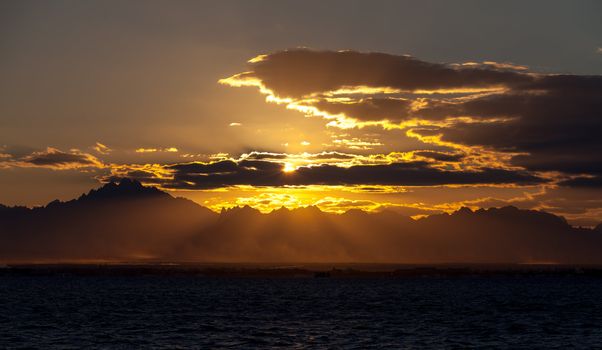 Romantic View of a Sunset over a Mountains