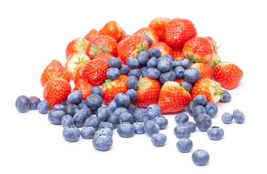 Heap Fresh Strawberries and Blueberries on white background