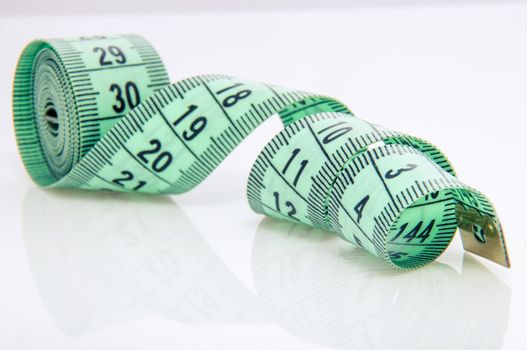 An image of green centimeter on white background