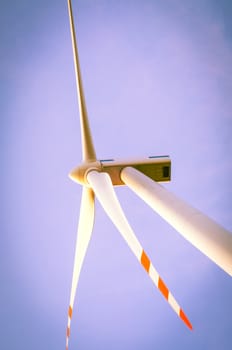 An image of windturbine of suny day
