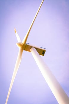 An image of windturbine of suny day