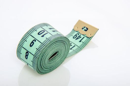An image of green centimeter on white background
