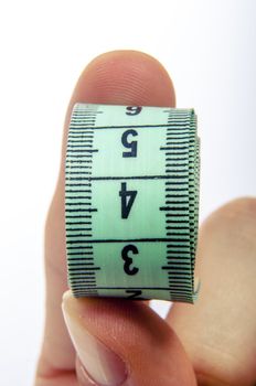 An image of green centimeter on white background
