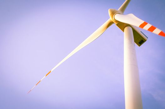 An image of windturbine of suny day