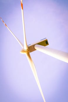 An image of windturbine of suny day