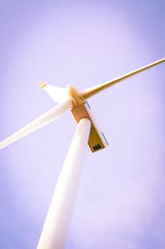 An image of windturbine of suny day
