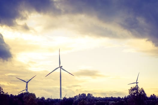 An image of windturbine during beautiful sunset