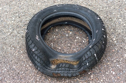Wrecked old tire on the street