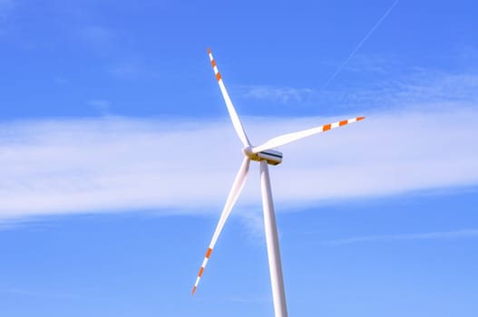An image of windturbine of suny day