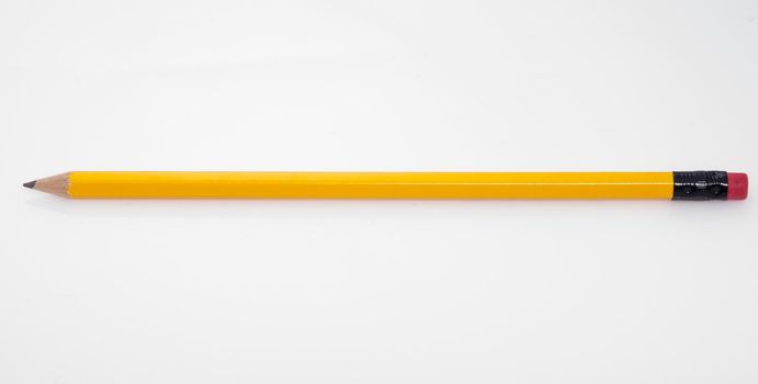 An image of yellow pencil on white background