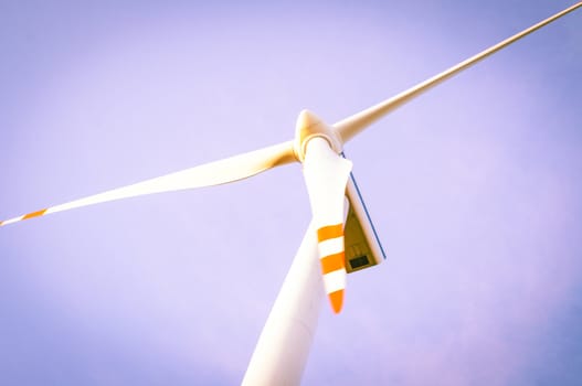 An image of windturbine of suny day