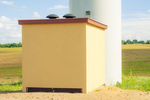 An image of windturbines against blue sky