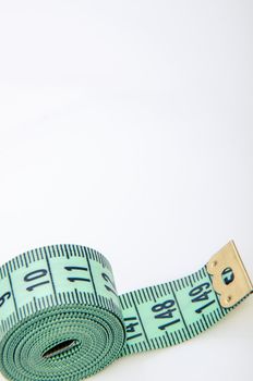 An image of green centimeter on white background