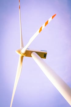 An image of windturbine of suny day