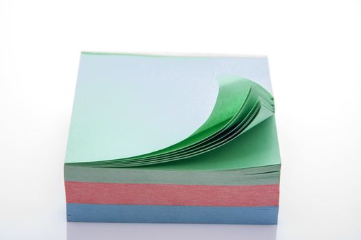 An image of stack of sticky notes isolated on white