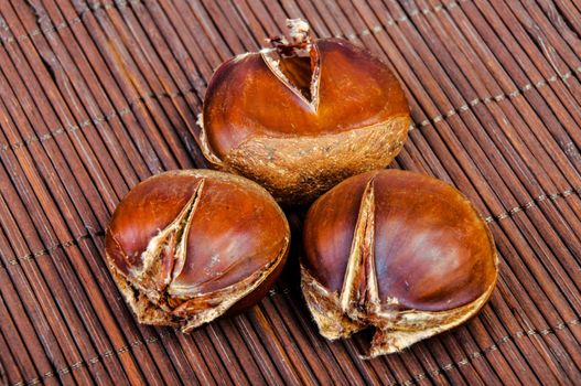 An image of roasted chestnut marron isolated. Castanea Sativa