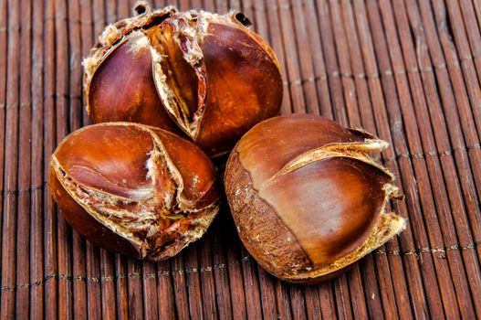 An image of roasted chestnut marron isolated. Castanea Sativa