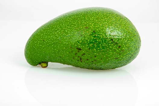 An image of avocado fruit isolated on white