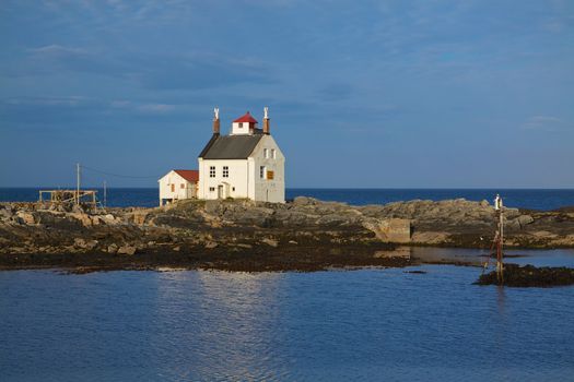 Old lighthouse building in Sorland on Lofoten islands in Norway