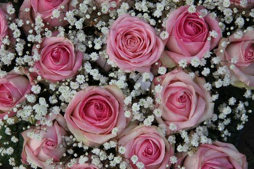 Wedding flowers, pink roses and white gypsophilia