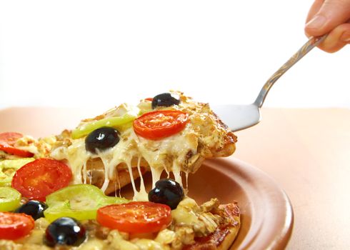 .home pizza with tomato and eggplant  Closeup .taking slice of pizza,melted cheese dripping. isolated on white background.
