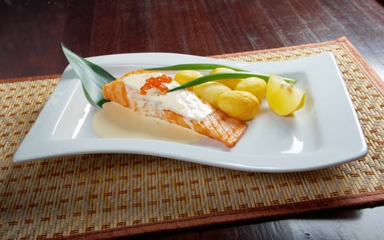 Salmon  with potato .cream sauce.Shallow depth-of-field