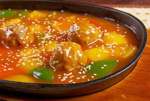 chinese cuisine .pork with tart sweet sauce,pineapple and pepper