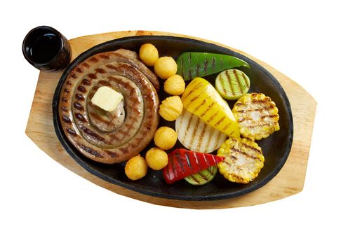 Japanese cuisine .Sausage making roasted with vegetable