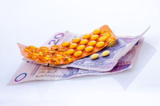 an image of pills and polish money zloty