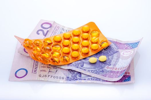 an image of pills and polish money zloty