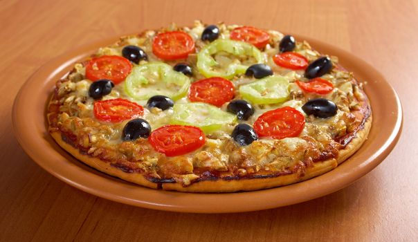 .home pizza with tomato and eggplant  Closeup 