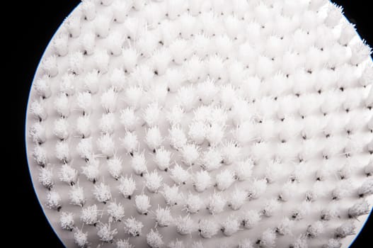 an image of white brush isolated on black