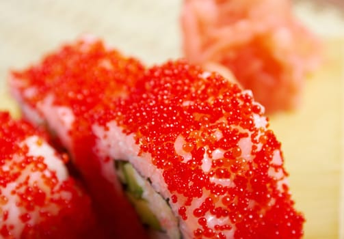 Japanese sushi  traditional japanese food.Roll made of Smoked fish and red roe