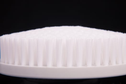 an image of white brush isolated on black