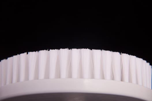 an image of white brush isolated on black