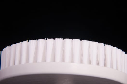 an image of white brush isolated on black