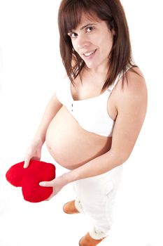 pregnant holds a heart