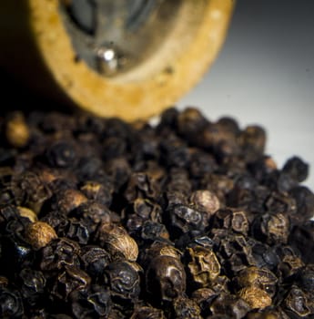 Close-up of lots of black pepper seeds