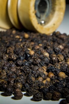 Close-up of lots of black pepper seeds