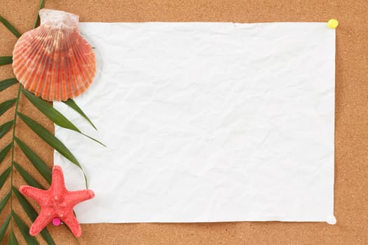 cocrboard with palm leave, crumpled paper and seashell for vacation message