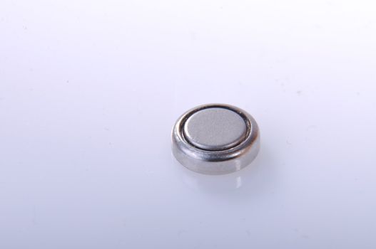 An image of small watch battery isolated
