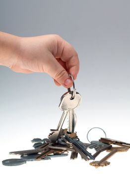 hand child with keys on a white background