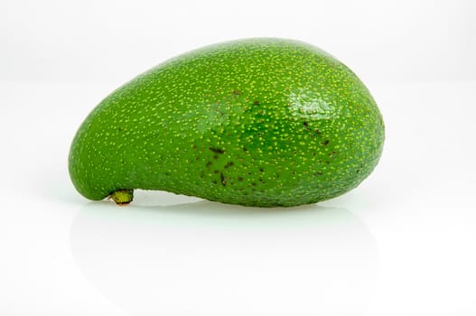 An image of avocado fruit isolated on white