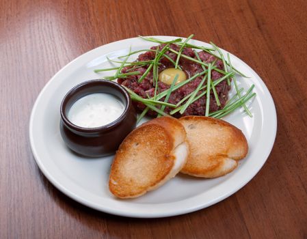 meat mincemeat with egg and crouton