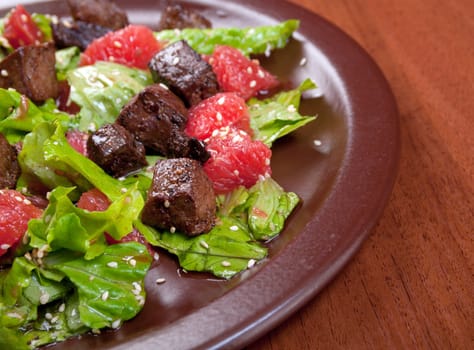 meat salad with vegetable and sesame. spanish kitchen